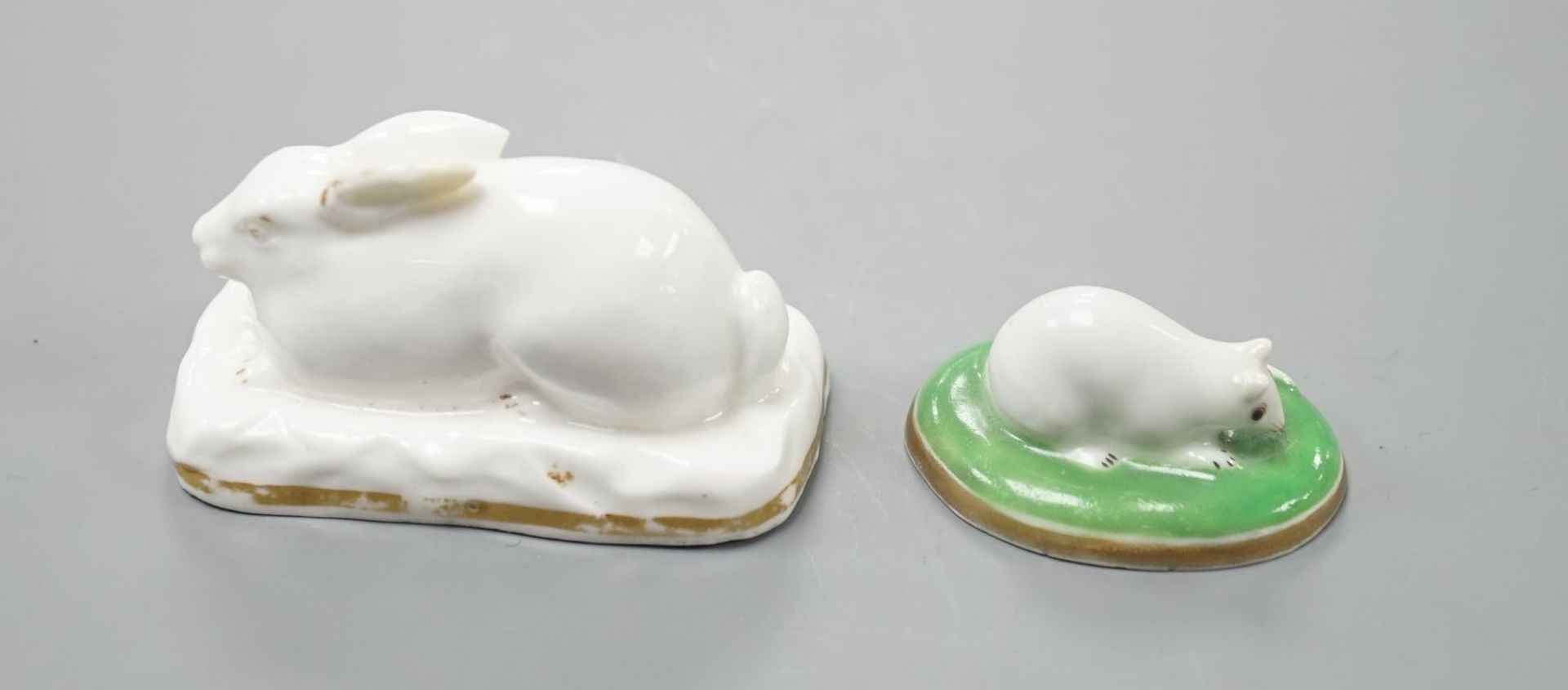 A rare Grainger Lee and co. porcelain model of a recumbent rabbit, c.1820-37, unmarked, 5.8 cm long and a Chamberlains porcelain model a recumbent mouse, c.1820-40, 3.9 cm long, Cf. Dennis G.Rice, English porcelain anima